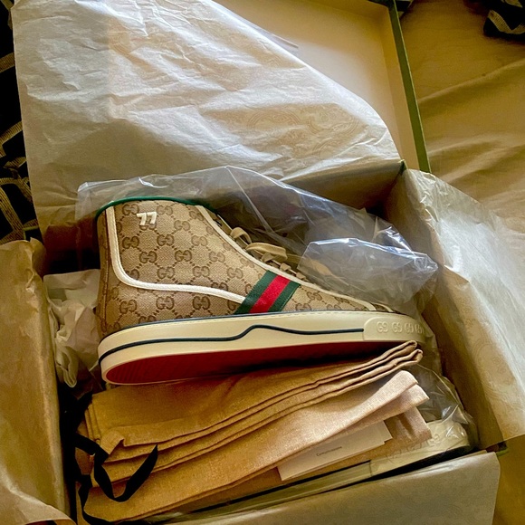 Gucci sneakers high top size 12 great condition with tags and bags.
